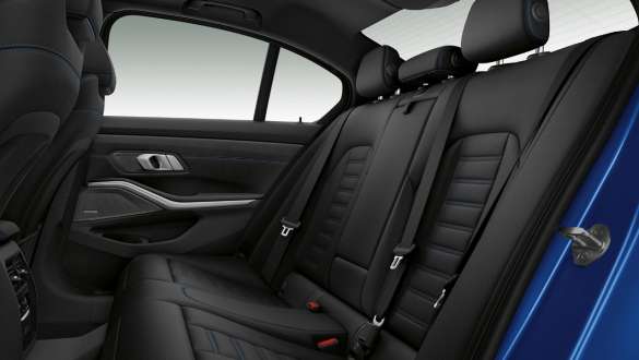 BMW 3-serie Sedan, sædevarme Nærbillede af bagerste sæderække set fra siden, med sædevarme for og bag.