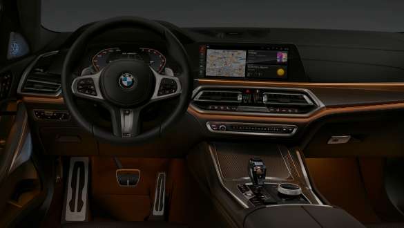 Cockpit med fokus på det stemningsskabende lys. BMW X6 cockpit med fokus på det stemningsskabende lys.
