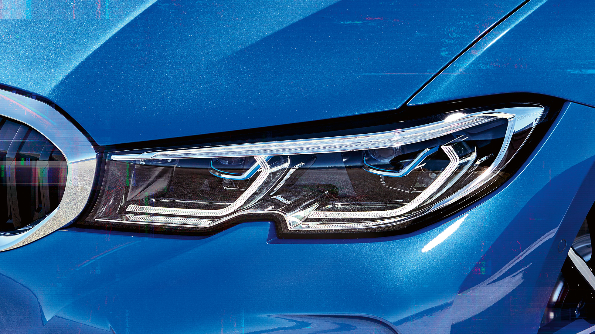 BMW 3-serie Sedan, BMW laserlys. Nærbillede fra siden af den højre forlygte med BMW laserlys.