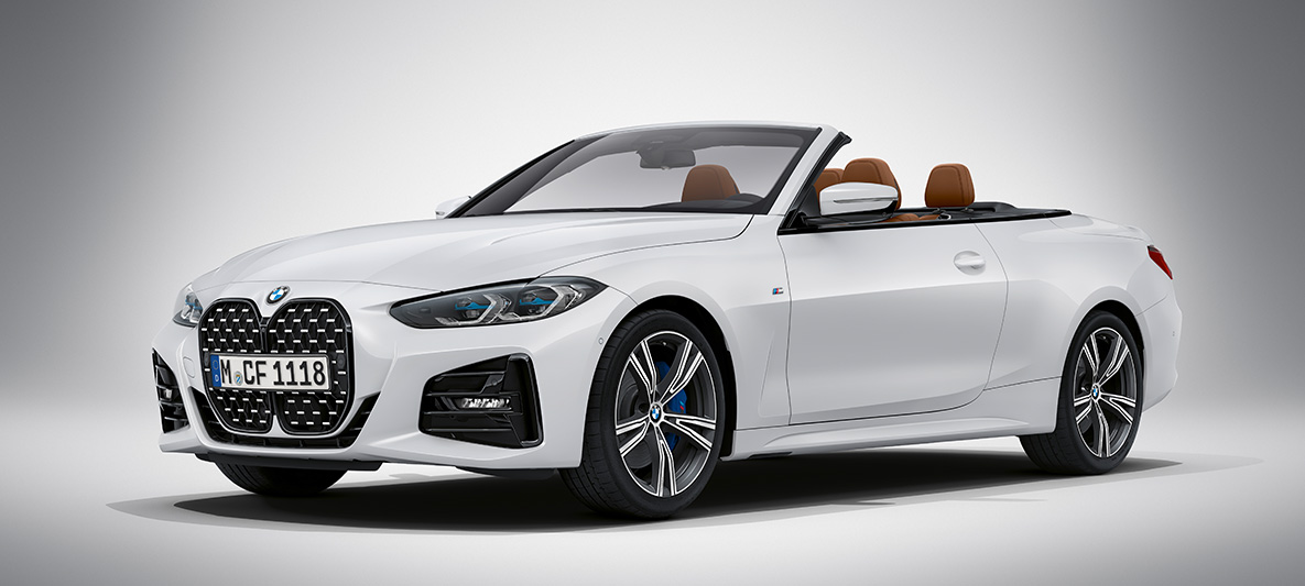 BMW Individual Brilliant White metallic BMW 4-serie Cabriolet G23 2020 BMW 4-serie Cabriolet Individual Brilliant White metallic G23 2020 set forfra let drejet holdende