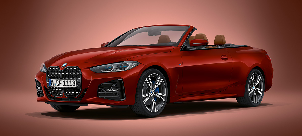 BMW Individual Aventurin Red metallic BMW 4-serie Cabriolet G23 2020 BMW 4-serie Cabriolet G23 2020 BMW Individual Aventurin Red metallic set forfra let drejet holdende