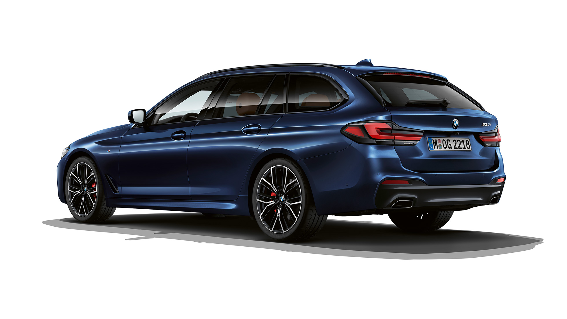 BMW 5-serie Touring G31 M Sportspakke bagende BMW 5-serie Touring 530e G31 2020 M Sportspakke i Tansanit Blue II metallic set bagfra let drejet