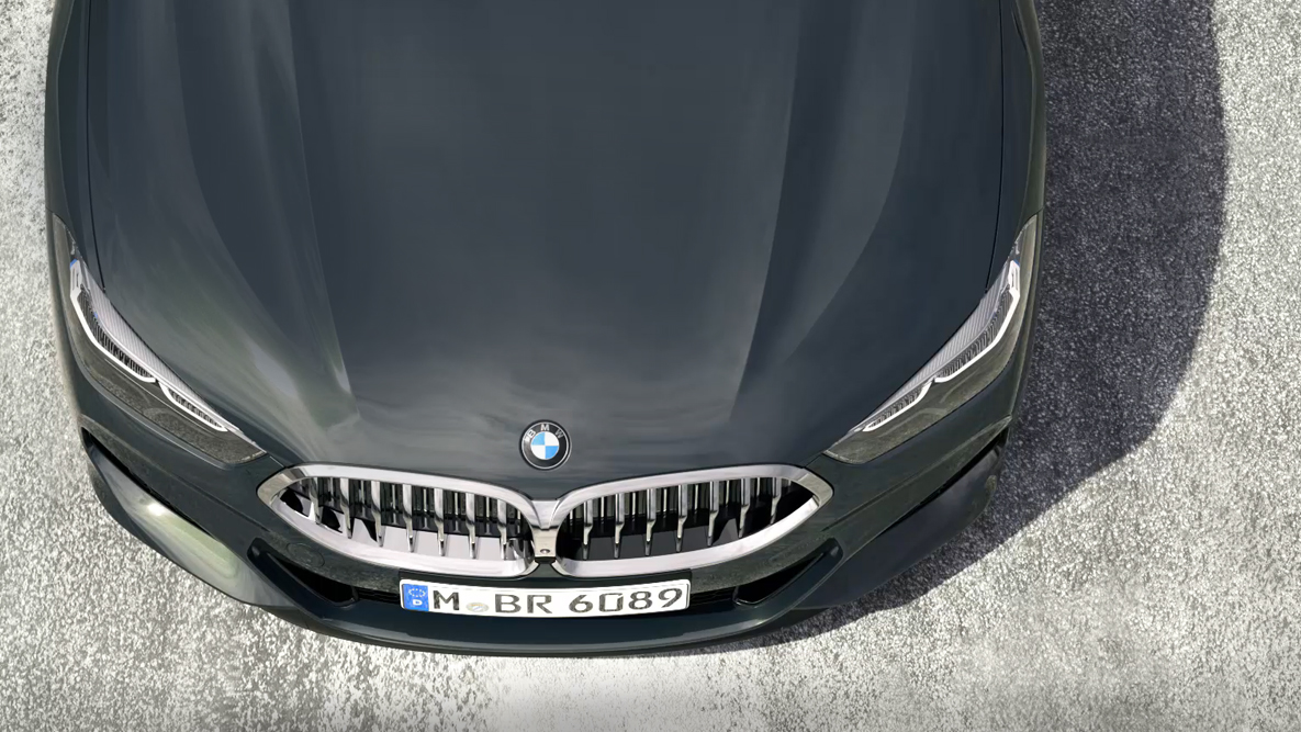 BMW M850i xDrive, set forfra fra fugleperspektiv, 8-cylindret BMW TwinPower Turbo-benzinmotor. BMW M850i xDrive, set forfra fra fugleperspektiv, 8-cylindret BMW TwinPower Turbo-benzinmotor.