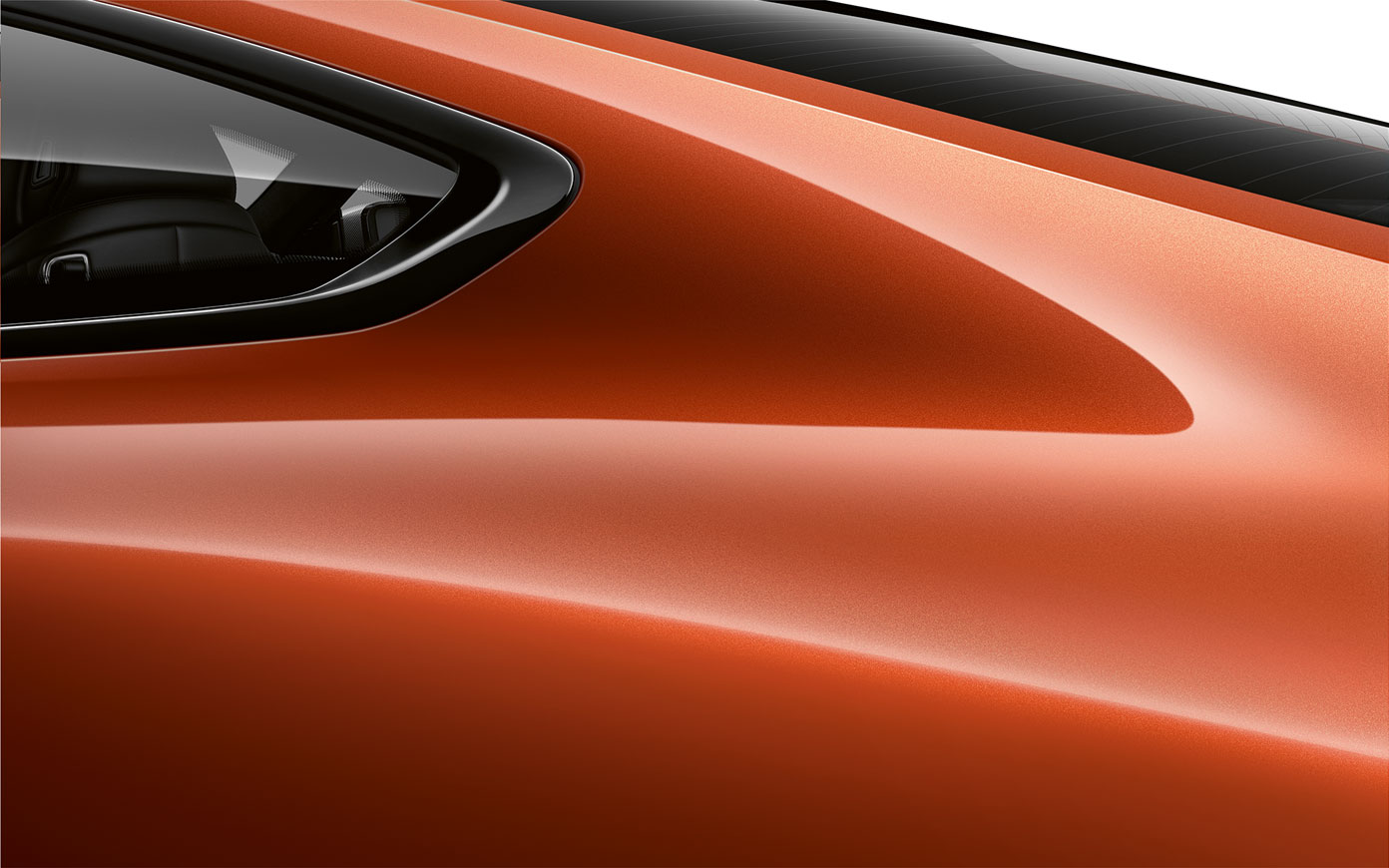 BMW 8-serie Coupé, nærbillede af C-stolpe. Nærbillede af C-stolpen på BMW 8-serie Coupé i Sunset Orange Metallic.