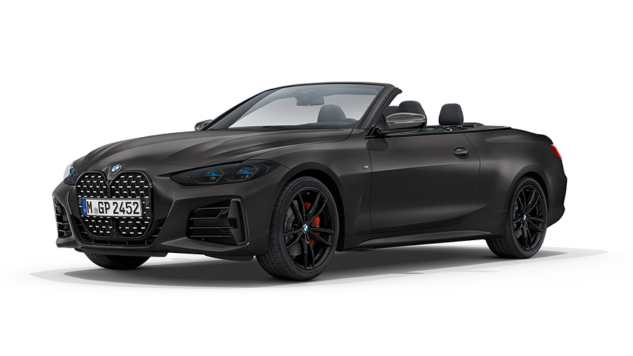 BMW M440i xDrive Cabriolet G23 2020 BMW Individual Frozen Deep Grey-metallic set forfra let drejet med åben stofkaleche