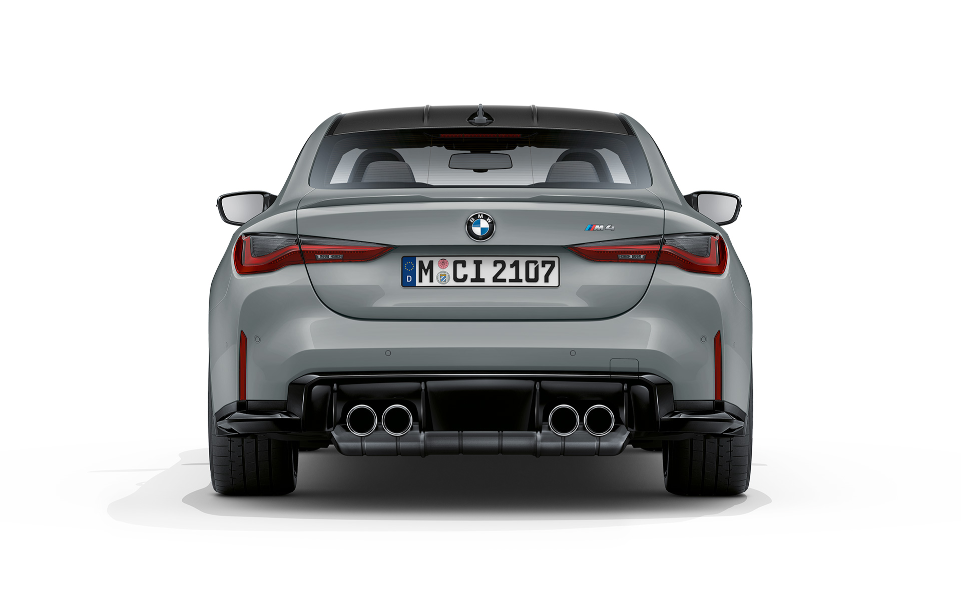BMW M4 Coupé G82 2020 Brooklyn grå metallic set bagfra