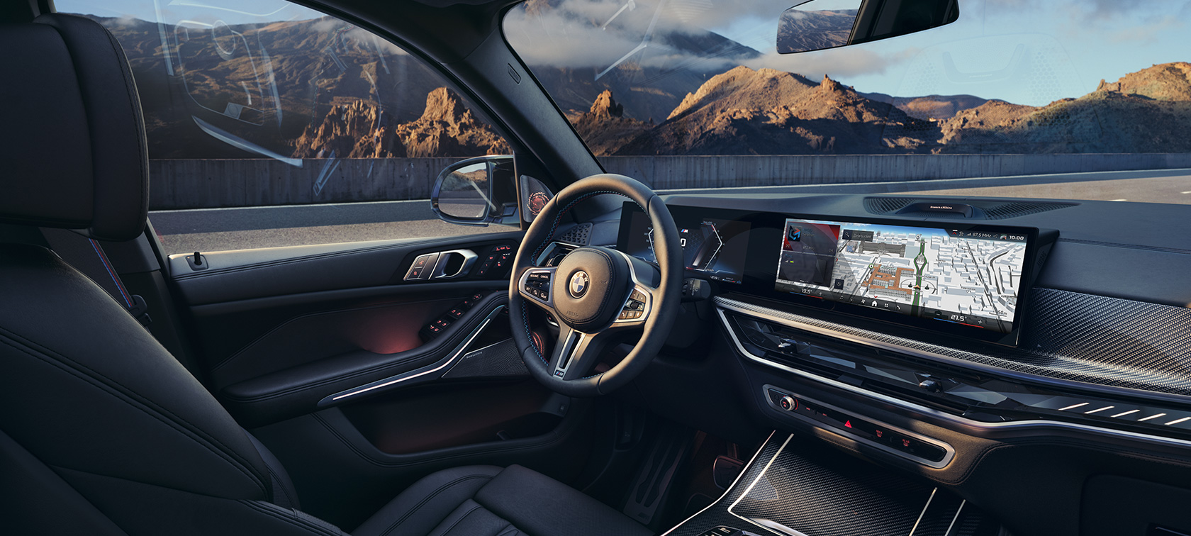 BMW X7 M60i G07 LCI cockpit indvendigt udstyr BMW X7 M60i G07 LCI cockpit indvendigt udstyr foran bjerglandskab