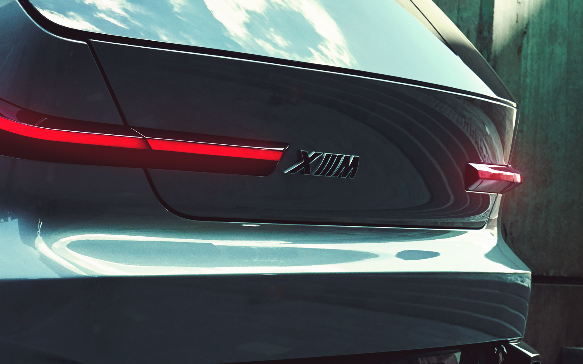 BMW Concept XM (G09) set bagfra let drejet stående nærbillede slutrør BMW Concept XM (G09) set bagfra let drejet stående nærbillede slutrør